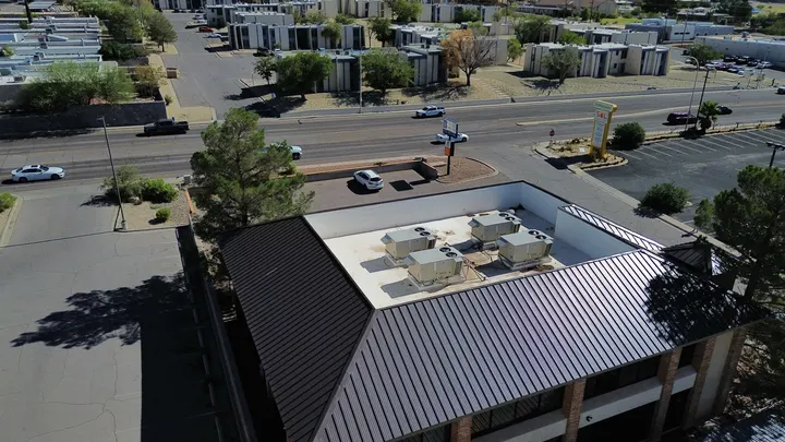 Commercial building with a new metal mansard roof