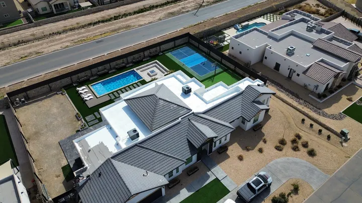 Modern El Paso home with tile and flat roof sections