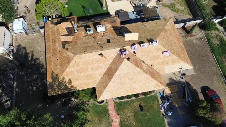 New roof decking installed after a full tear-off